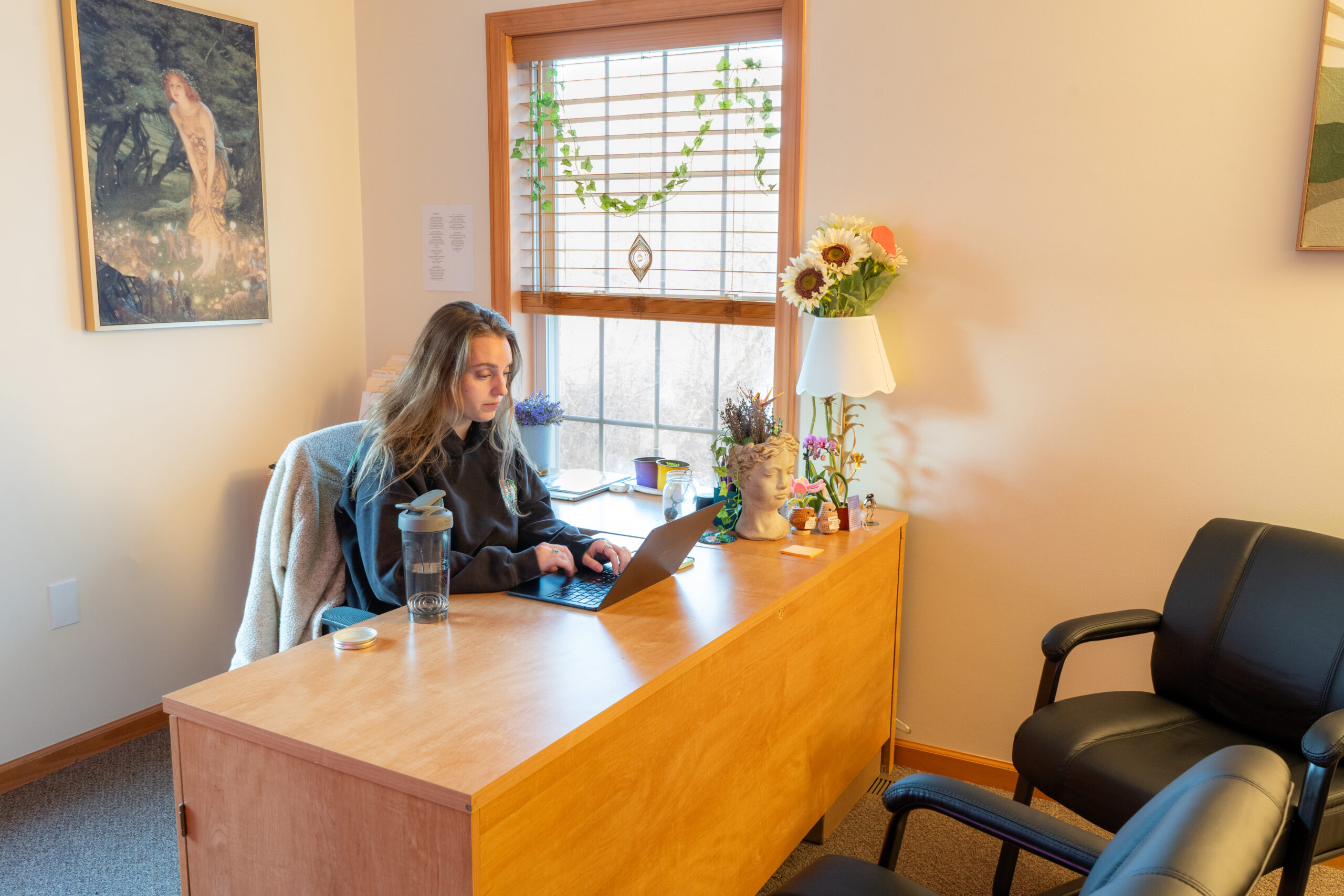 A person working in a drug addiction treatment and mental health facility, catered towards women.
