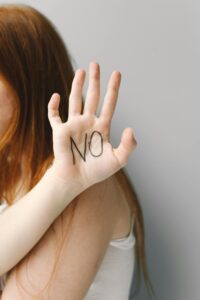 A woman learning the importance of saying no during addiction recovery.