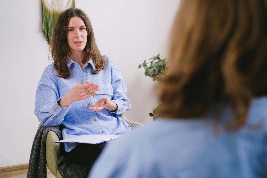 A person in therapy for a weight loss pill addiction.