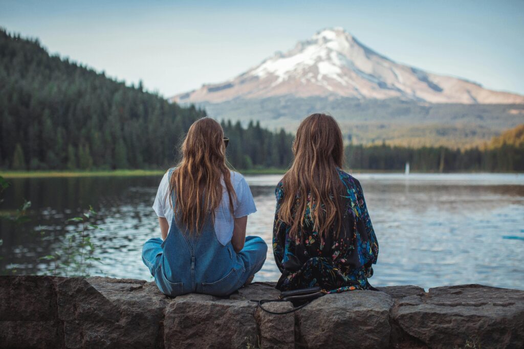 A woman going through alcohol withdrawal being supported by her friend.