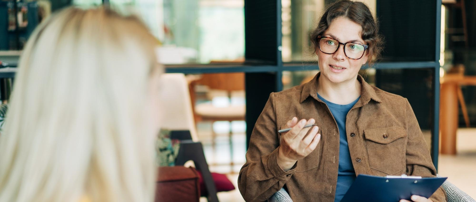 A woman getting outpatient cognitive-behavioral therapy (CBT) at Luna Recovery for Women in North Andover, MA.