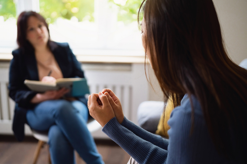 A woman getting women-centered mental health treatment at Luna Recovery for Women in North Andover, Massachusetts.