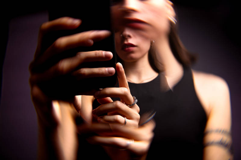 A young woman experiencing OCD symptoms.