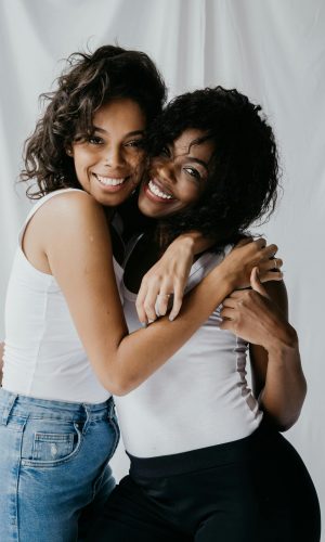 Friends showing why alumni programs are important in addiction recovery.